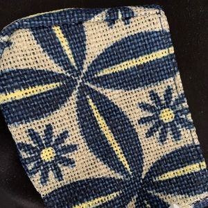 Perfect Burt’s Bees lipstick/gloss or mini-wallet or coin purse.